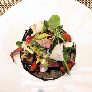 Seared octopus with mustard greens, charred carrots, spicy Szechuan-style pork rinds, and some tamarind bringing it all together at Quail's Gate Winery in West Kelowna, British Columbia. (It's not Vancouver, but definitely worth a road trip).