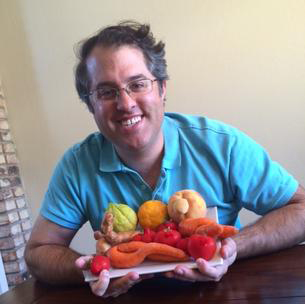Jordan Figueiredo with some "ugly" fruit and vegetables.