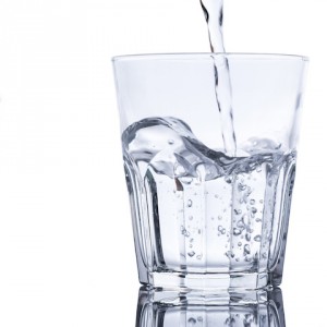 Glass with fresh water on white background